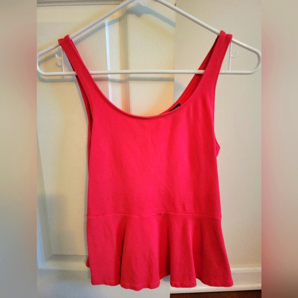 Hot pink top from Express. Size XS. Like new. Has a zipper on the back